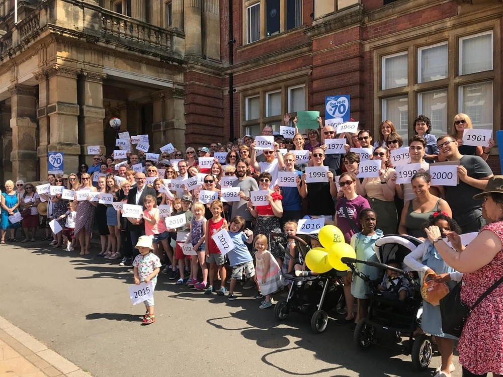 Locals celebrating the NHS' 70th birthday at an event in 2018 (image via Matt Western's office)