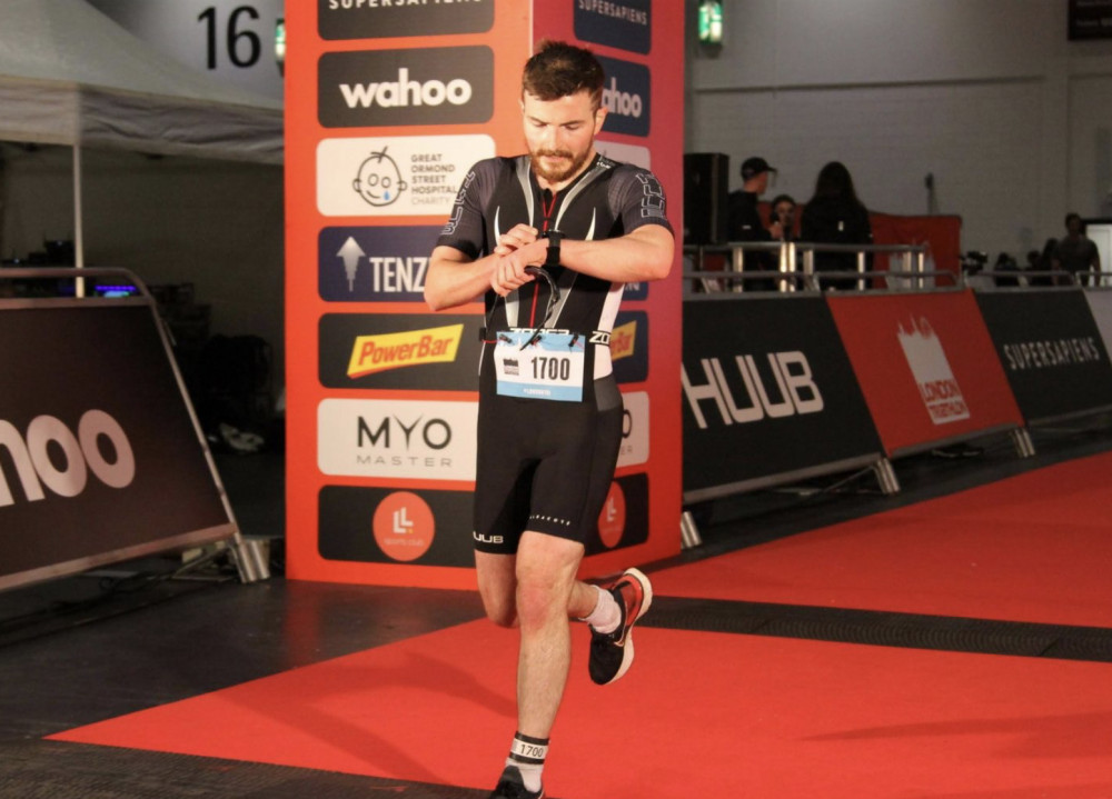 Meet James Gore from Letchworth who is renowned North Herts youth charity Phase's new school worker. PICTURE: Sporty James at the finish line of the London 2021 Triathlon. CREDIT: Phase 