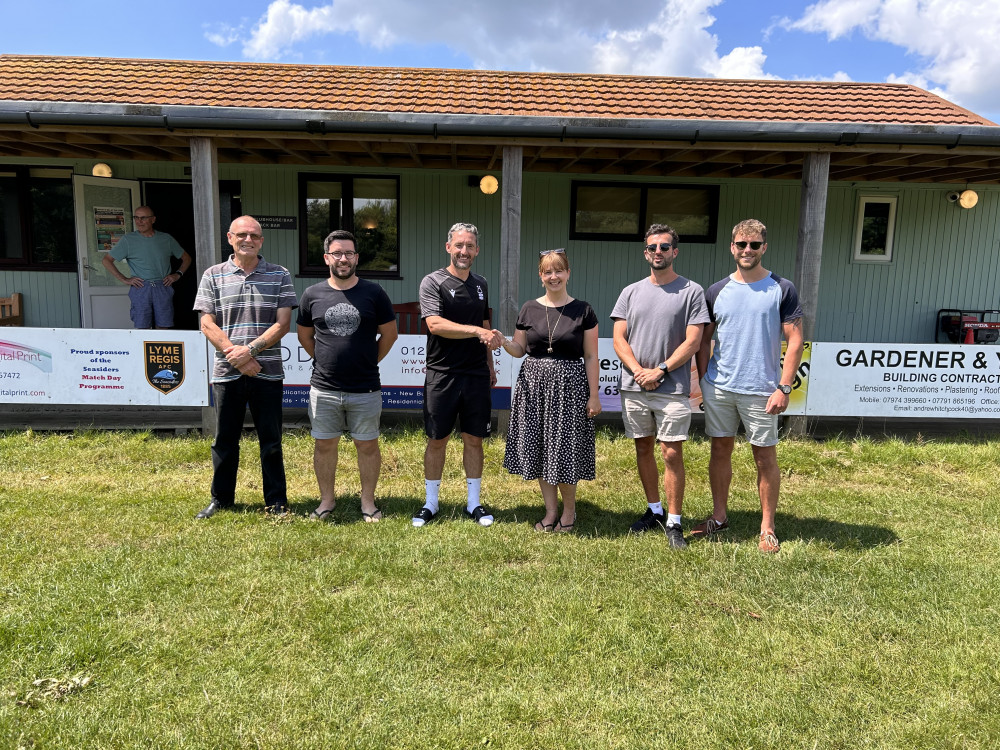 Club vice-chairman Francesca Evans welcomes new manager Mickey Hunt to the Davey Fort with Youth Section chairman Martyn Wright and players Robbie Fellingham, Rob Larcombe and Alex Rowe