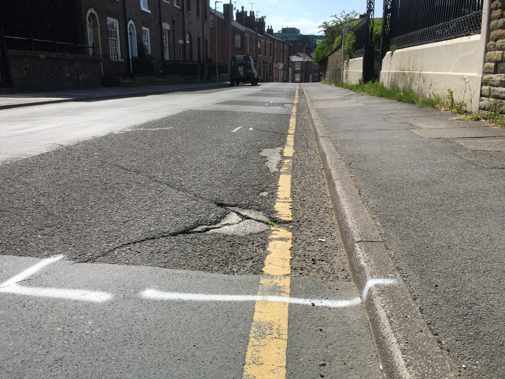 Potholes on Roe Street in Macclesfield this month. (Image - Macclesfield Nub News) 