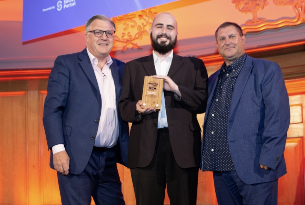 Shaun Davies, assistant bid writer at MC Construction, with guest speaker Ed Balls, left, and Darren Knowd, chairman of the Social Value Task Force. 