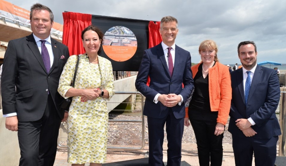 Transport Secretary Mark Harper, centre, unveiling plaque at sea wall with Dawlish's MP Anne Marie Morris, second from left, and East Devon MP Simon Jupp, right (Network Rail)