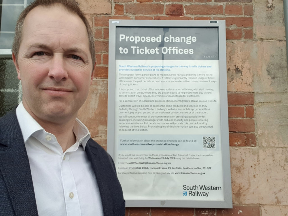 Axminster's MP Richard Foord pictured at the town's railway station where proposed ticket office changes are being advertised