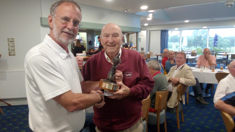 Senior's captain Steve Thompson, on the left, presenting the winner Geoff Hughes with the Trophy at his Away Day at Taunton & Pickeridge