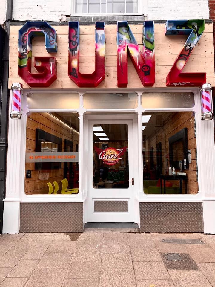 The former signage outside Gunz Barbers had become something of a local landmark