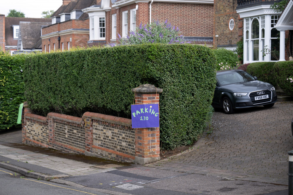 Local houses are also renting out their drives for people to park before heading to Wimbledon (image via SWNS)