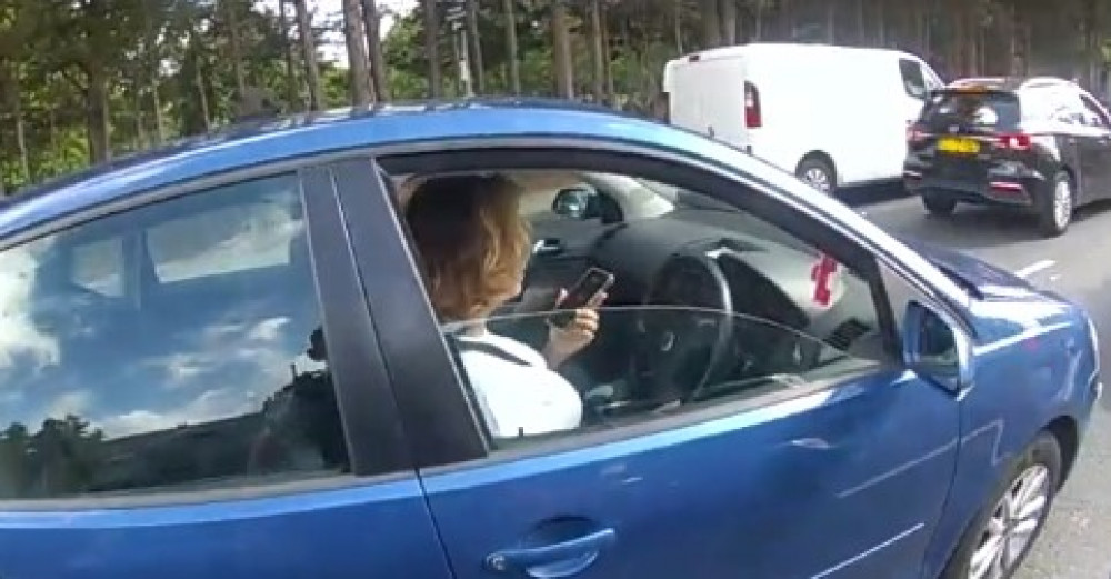 Police in the borough have warned drivers they face bans if they use their mobile phones at the wheel after catching a woman driver twice for the offence.