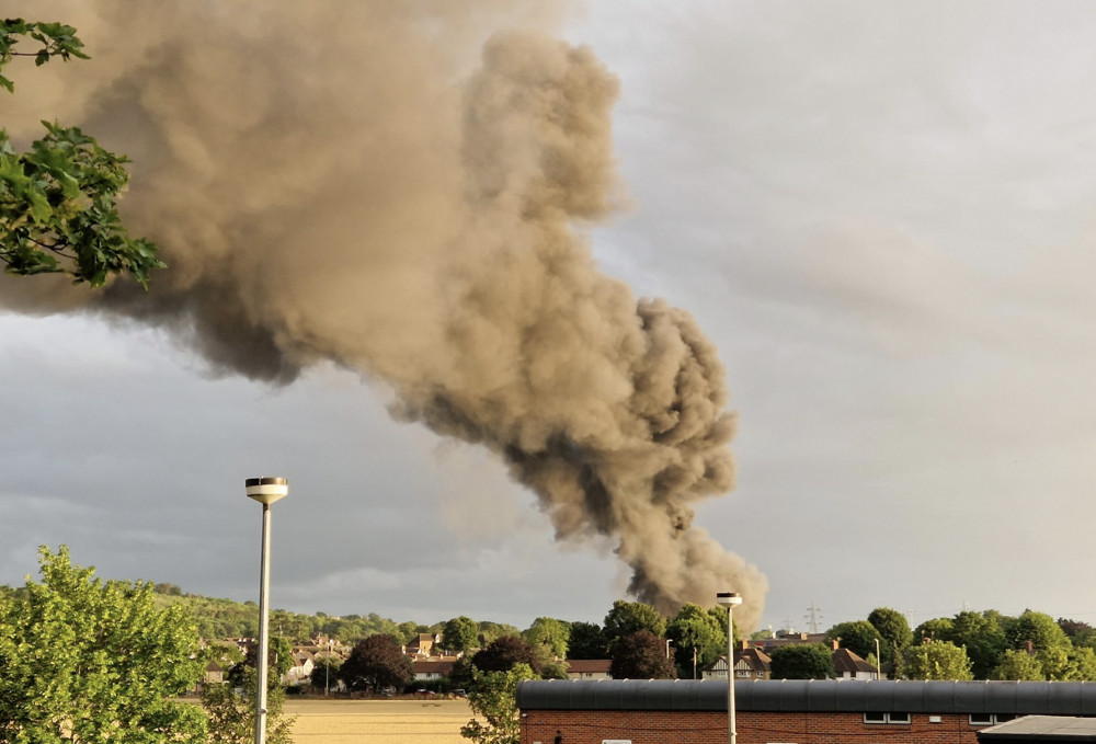 Smoke billows into the air from the large fire at Baldock Industrial Estate. CREDIT: Simon Watts