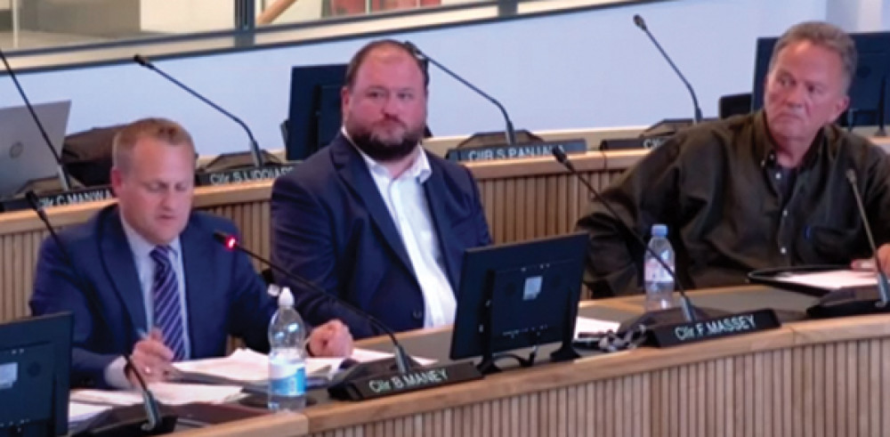 Cllr Ben Maney delivers his rebuttal of the call-ins, watched by Cllr Fraser Massey and resident Dave Bowling.