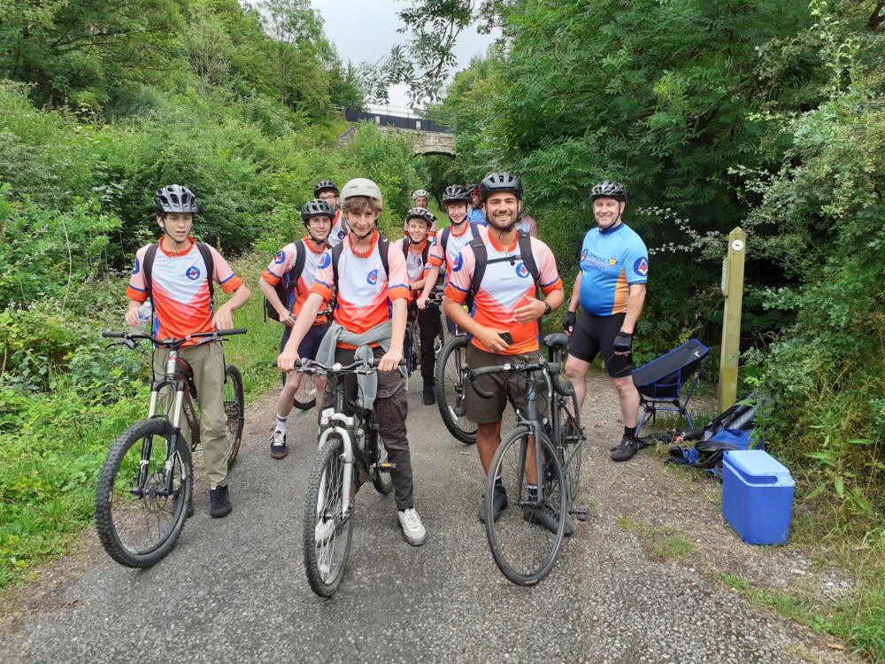 DofE participants joined with Somerset Freemasons taking a rest during their bike ride