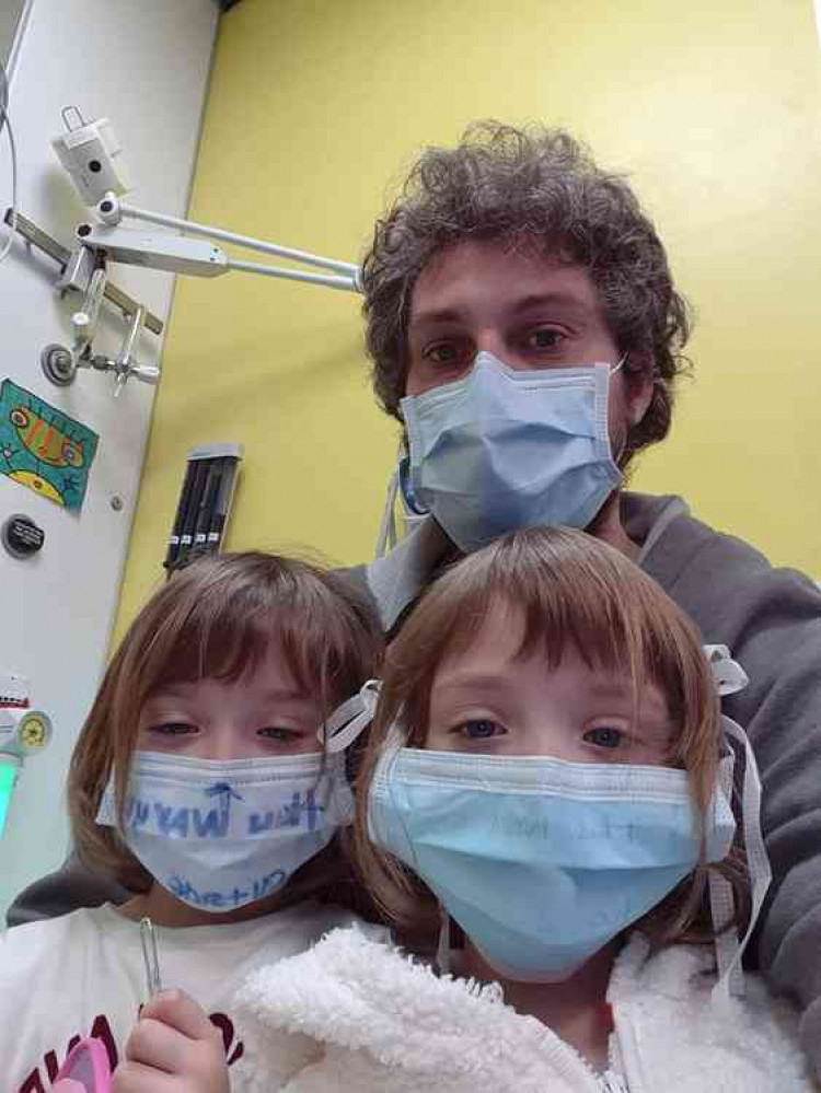 Kitty and Willow in hospital with their dad