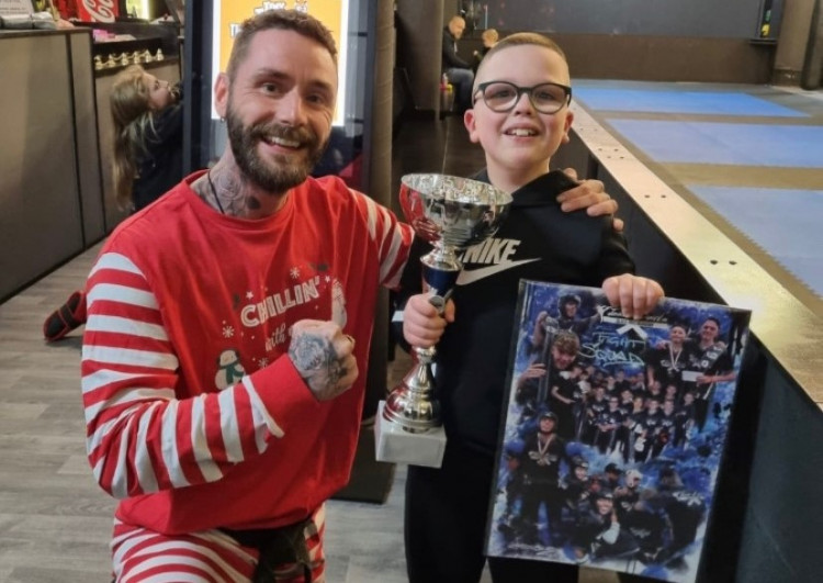 This local lad is making remarkable progress in the jiu-jitsu scene. Nine-year-old Brody is pictured here with coach Jason Baird (Image - Jade Black)