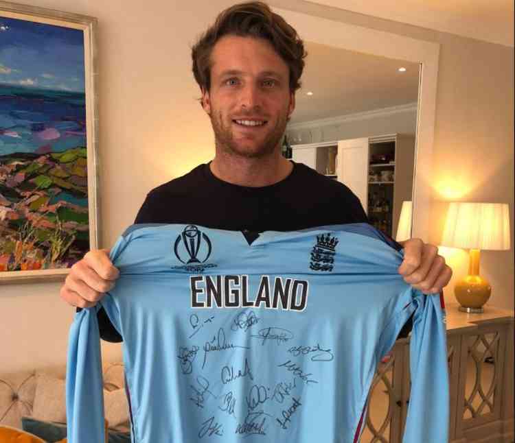 Jos Buttler with the signed shirt