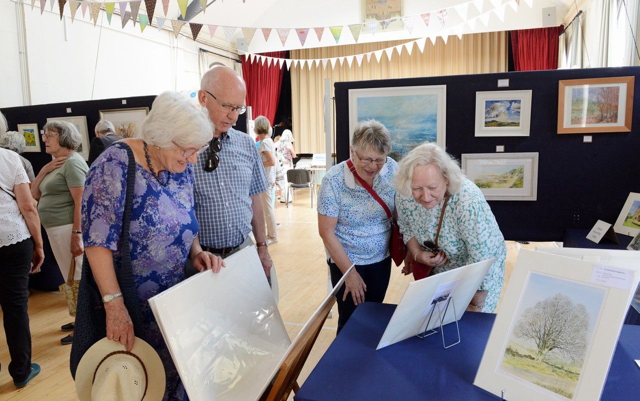 Visitors to the art exhibition in Burton Bradstock Village Hal