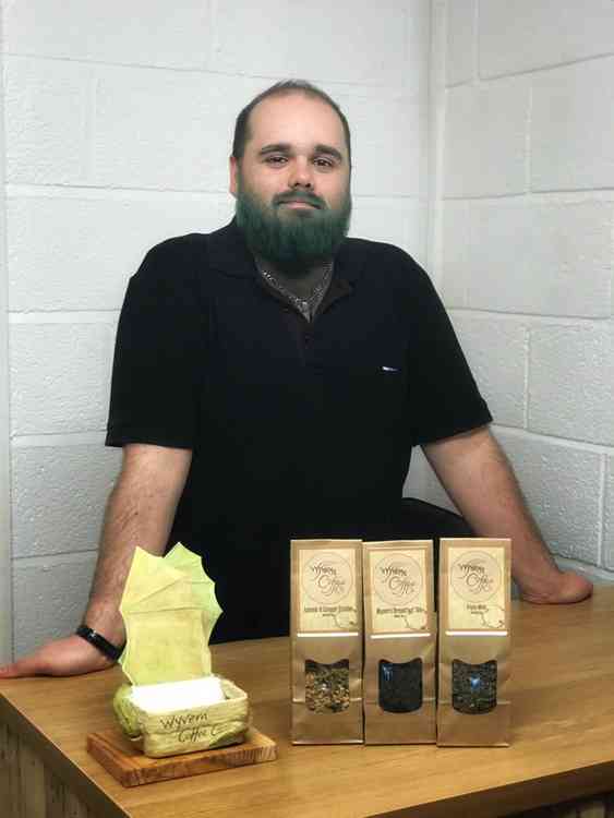 Wyvern Coffee Co's Tom Anderson, with his beard dyed blue in support of the NHS