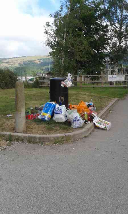 Overflowing litter bins