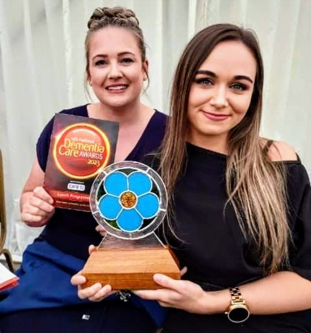 Lead senior support workers at Belong Crewe, Stacey Wright and Paige O'Neill, with their National Dementia Care Award (Nub News).