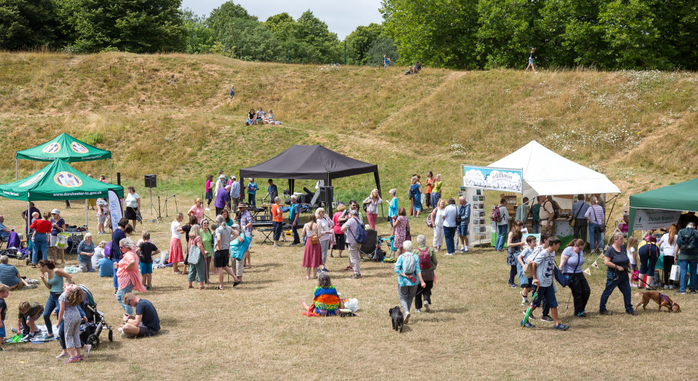 Visitors to HengeFest 2022 in Maumbury Rings