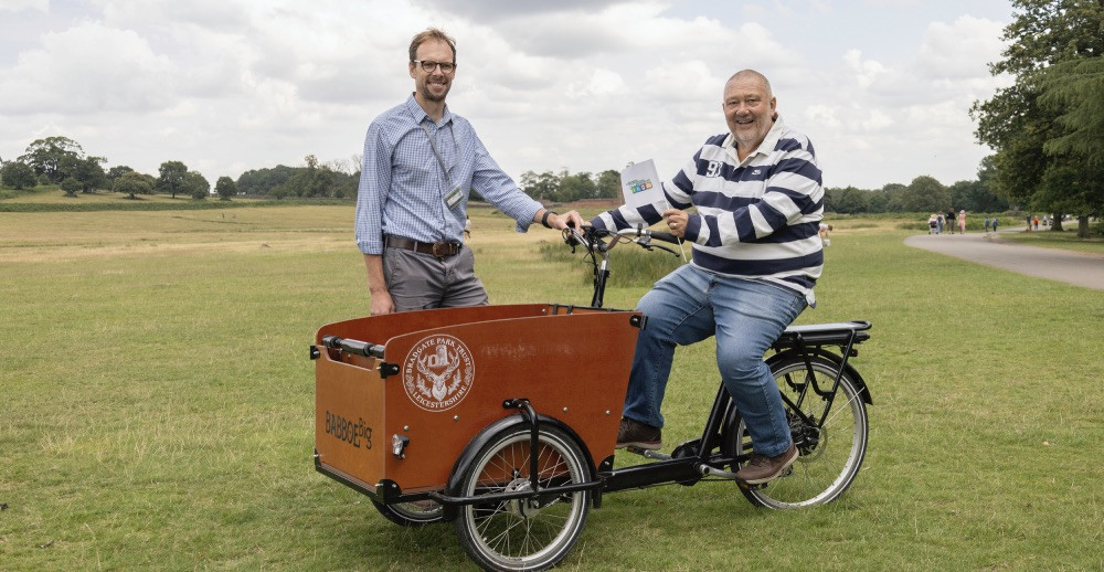 James Dymond, Director of Bradgate Trust, and Councillor Ozzy O'Shea with the electric cargo bike. Photo: Leicestershire County Council