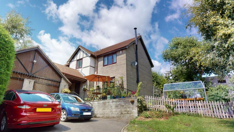 The four bedroomed detached home also has a large conservatory