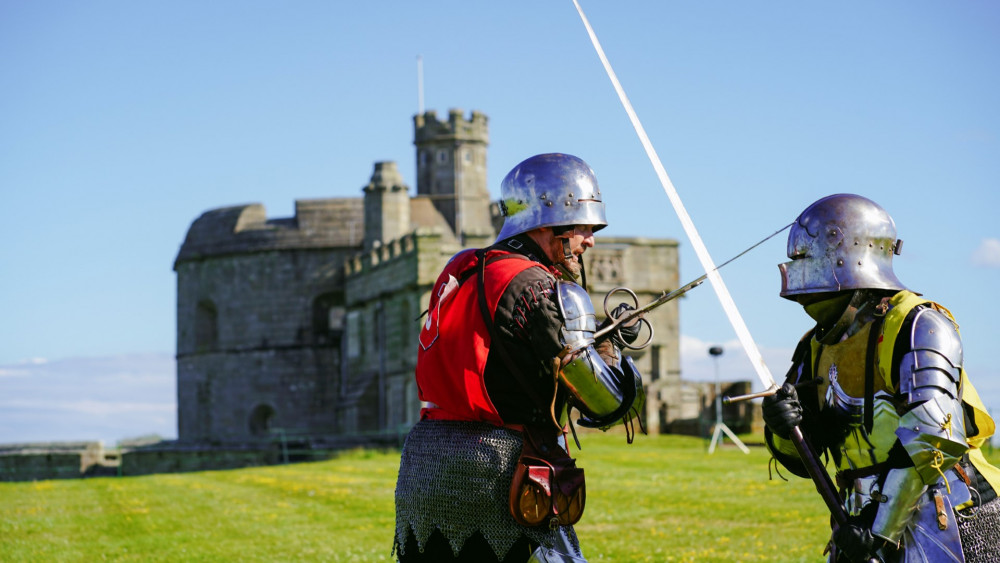 Take in some medieval entertainment this summer. (Image: English Heritage) 