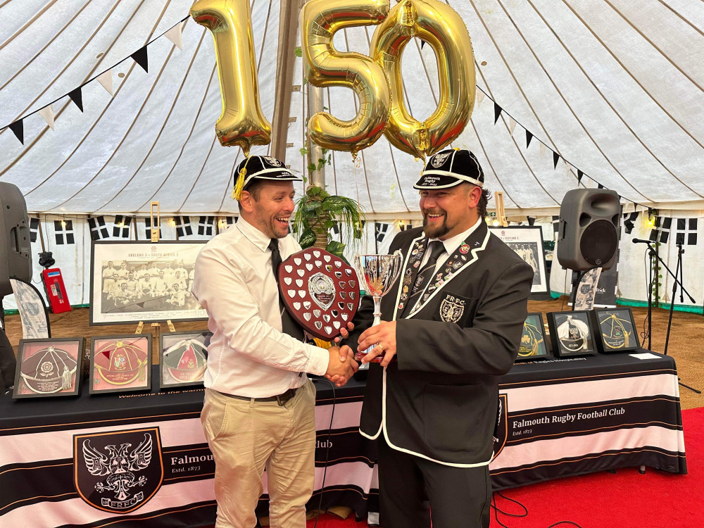 Director of Rugby - Tom Spiller with the Presidents Shield and Danny Trick (Right) - club ambassador with The John Bullock Cup Club person of the year trophy. (Image: Falmouth Rugby) 