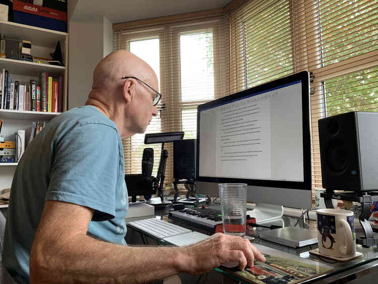 Author Rob Kail-Dyke at his desk with new book Black Moon Over Malvern