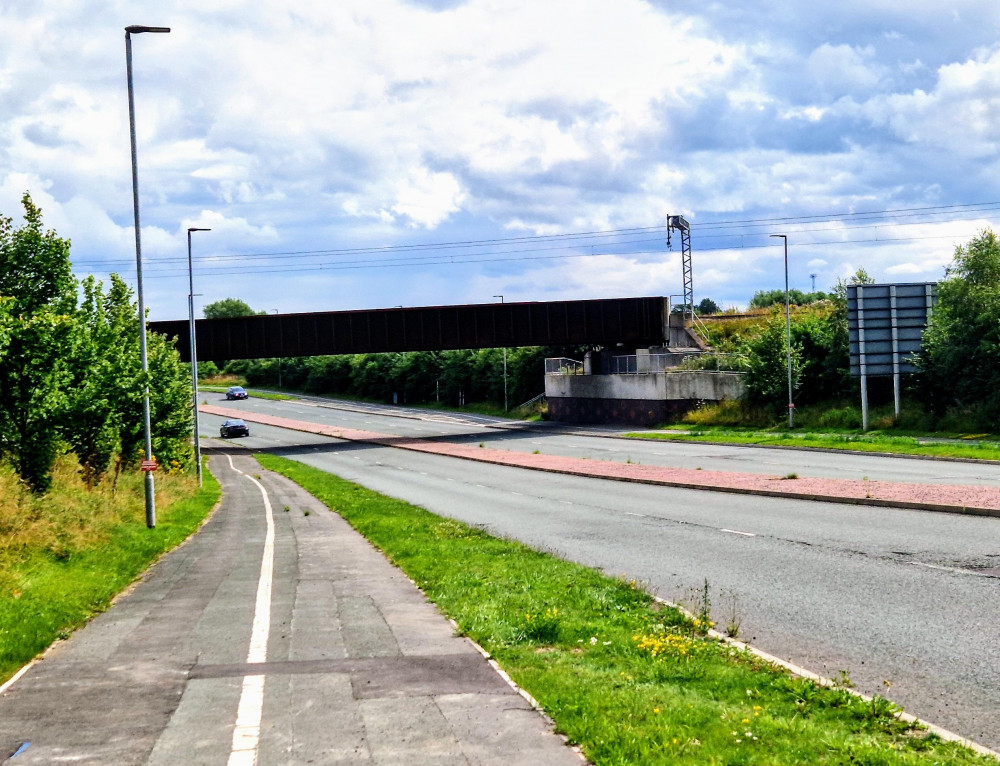 The Crewe to Derby line passes over a bridge on David Whitby Way (Ryan Parker).