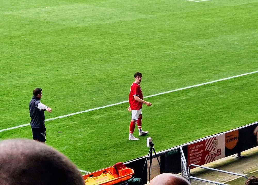 Chris Long came off in the first-half of Crewe's pre-season home defeat to Lincoln City (July 22), suffering a 'slight' ankle ligament strain (Ryan Parker).