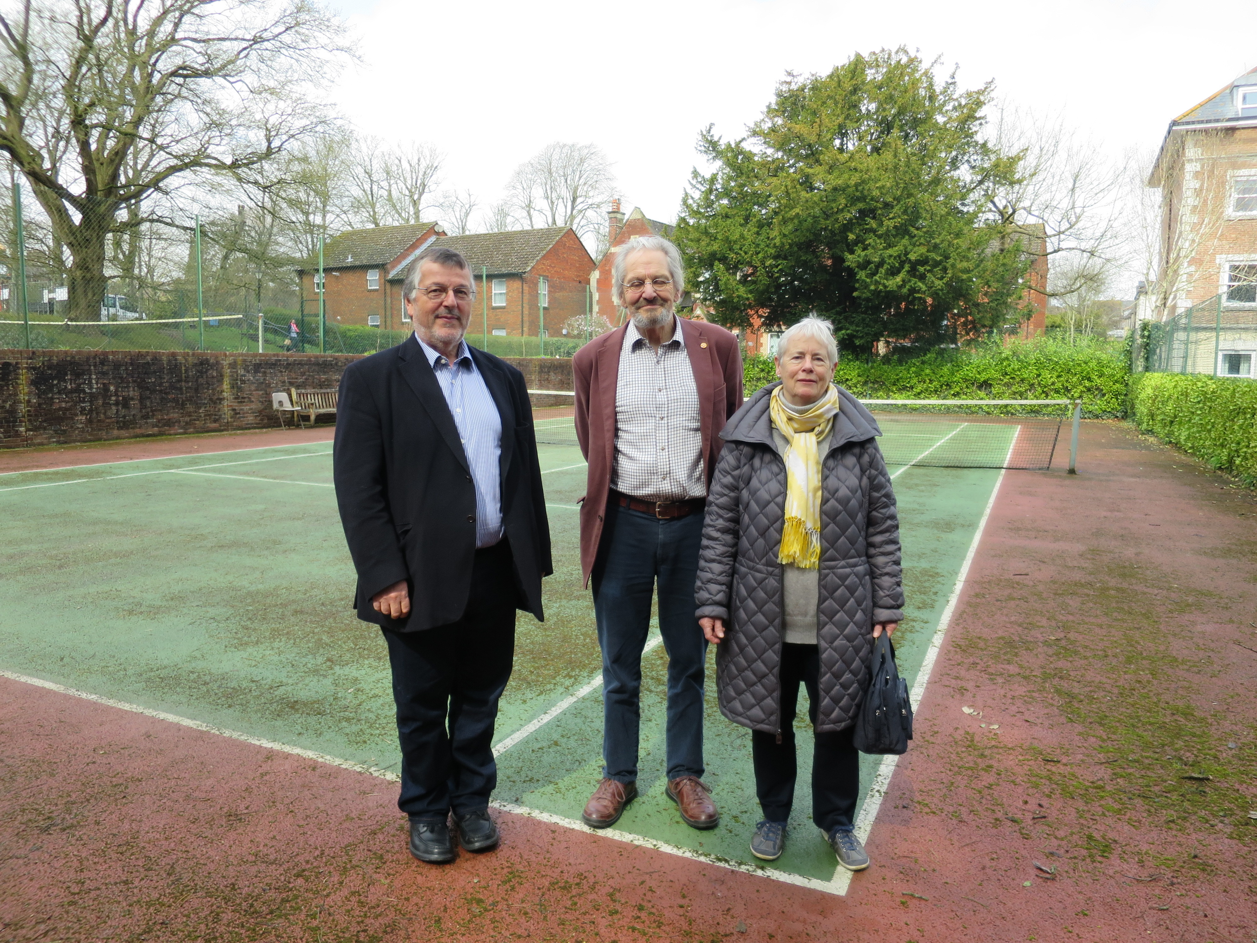 Trust directors Andy Spillman, Cllr Alistair Chisholm and Tricia Mitchell at the tennis court, pictured at the start of the project