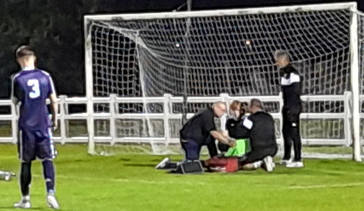 Brantham keeper Finn Shorters being treated (Picture: Nub News)