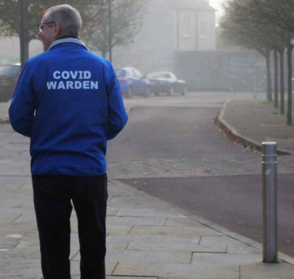 A covid warden working in Mendip earlier this month