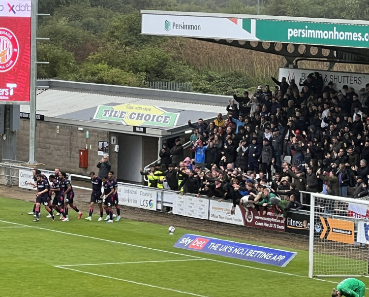 League One full time result: Northampton Town 0-1 Stevenage. PICTURE: The travelling Stevenage fans celebrate captain Carl Piergianni's late goal to clinch victory for Boro on their return to League One. CREDIT: @laythy29