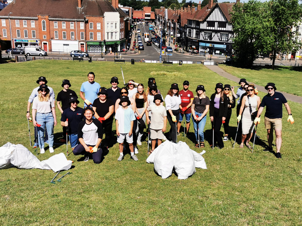 Kindhearted Willmott Dixon and Mitsubishi volunteers clean up Hitchin's Windmill Hill