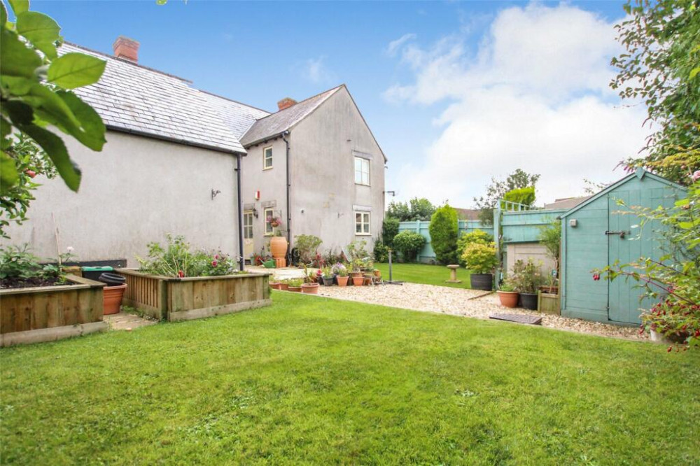 To the rear a large garden for this Midsomer Norton home 