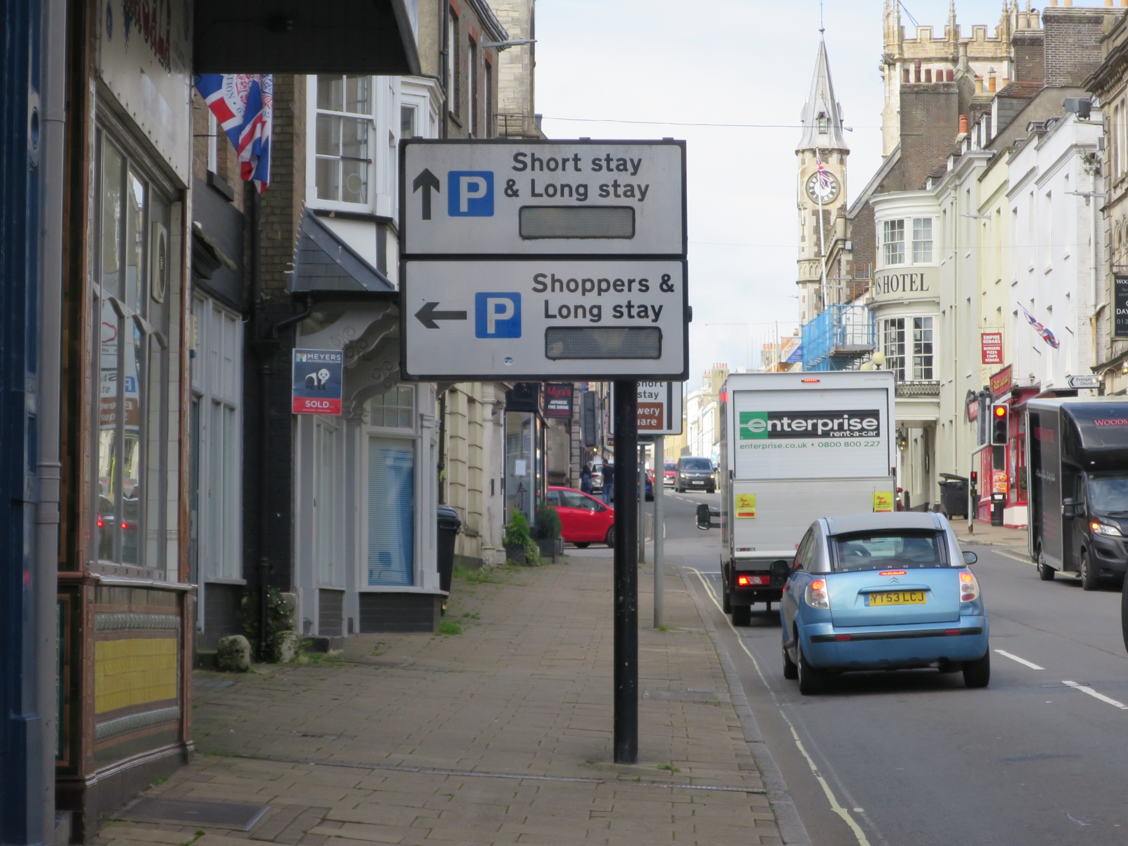 Blank screens at this town centre parking sign in High East Street