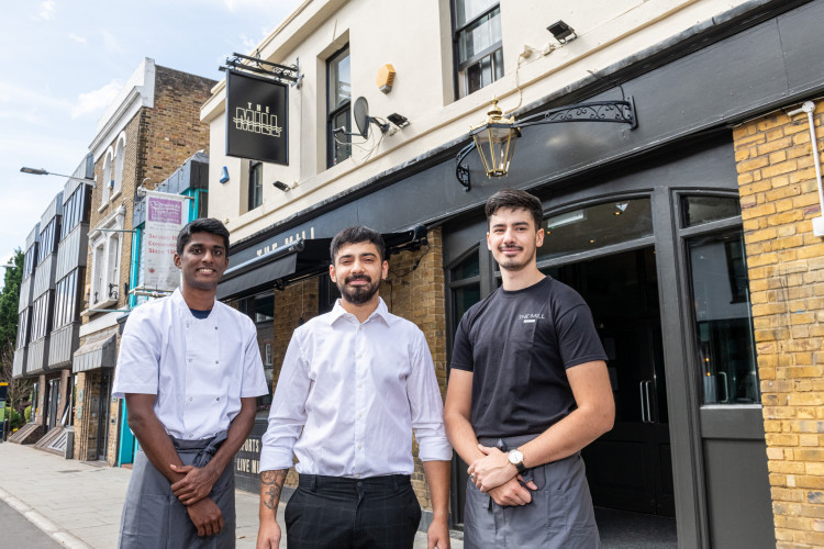 Staff outside the renovated pub. (Photo: The Mill)