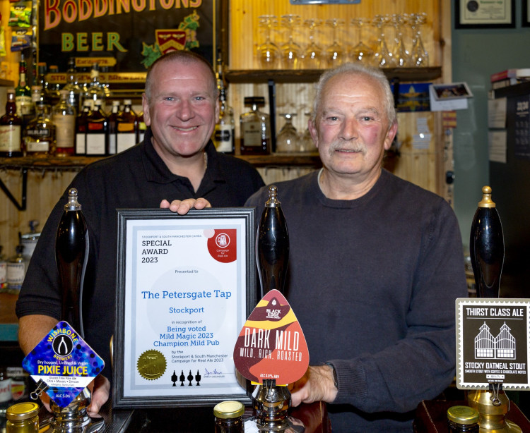 Mild Magic organiser Darren Berry (left), and Petersgate Tap owner Alan Gent with the Champion Mild Pub certificate (Image - CAMRA)