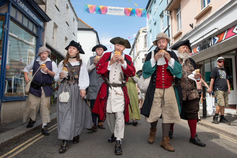 Reenactors from English Heritage’s Pendennis Castle and performers. (Image:  Emily Whitfield Wicks & English Heritage) from National Maritime Museum Cornwall made land in Falmouth. 