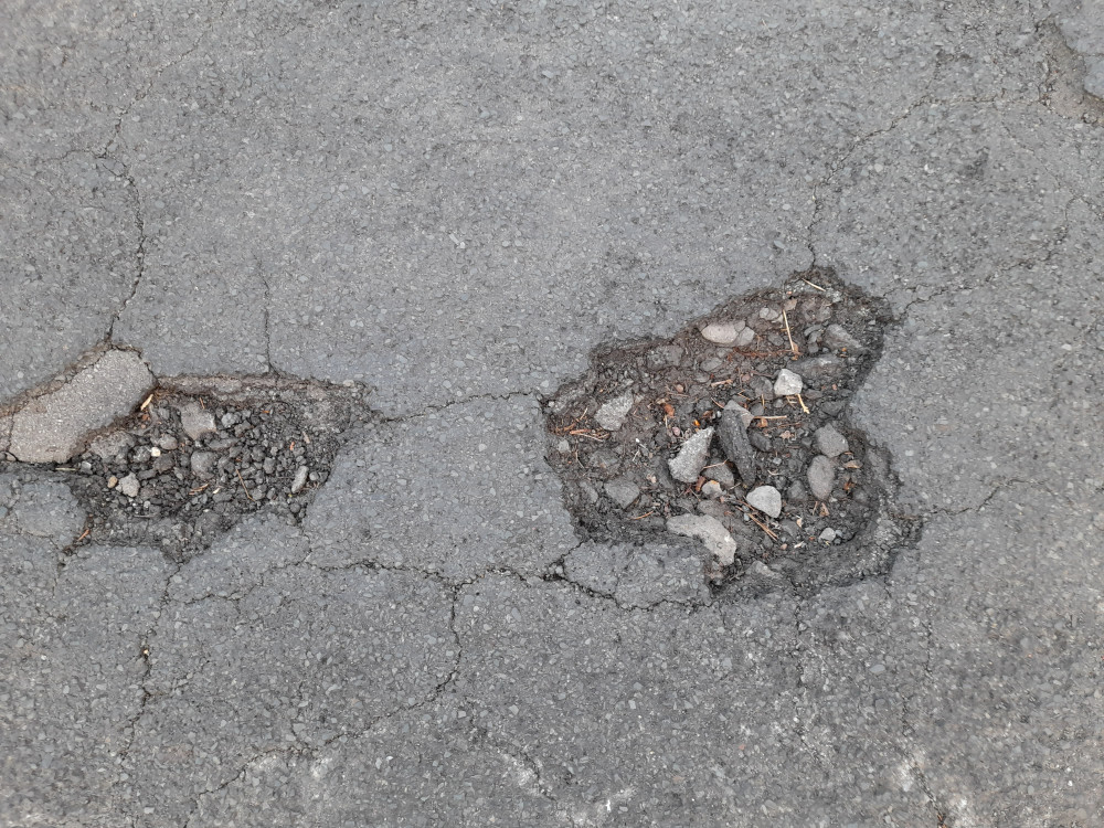 Potholes are a regular local sight and menace