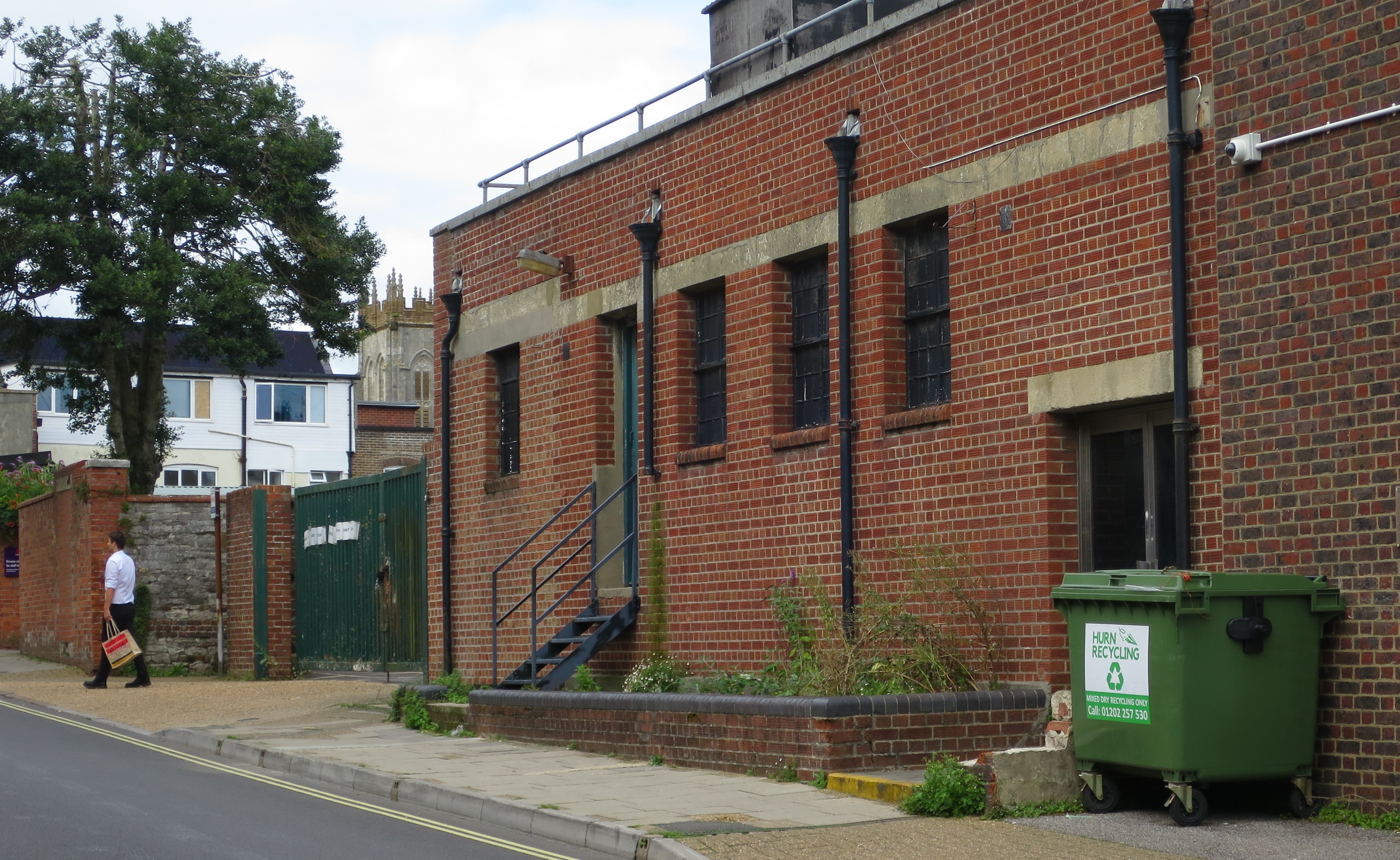 Vegetation growth to the rear of the former M&S building