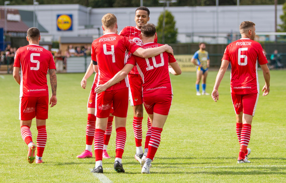 Skipper Billy Holland (4) get congratulations after goal (Picture: Stefan Peck)