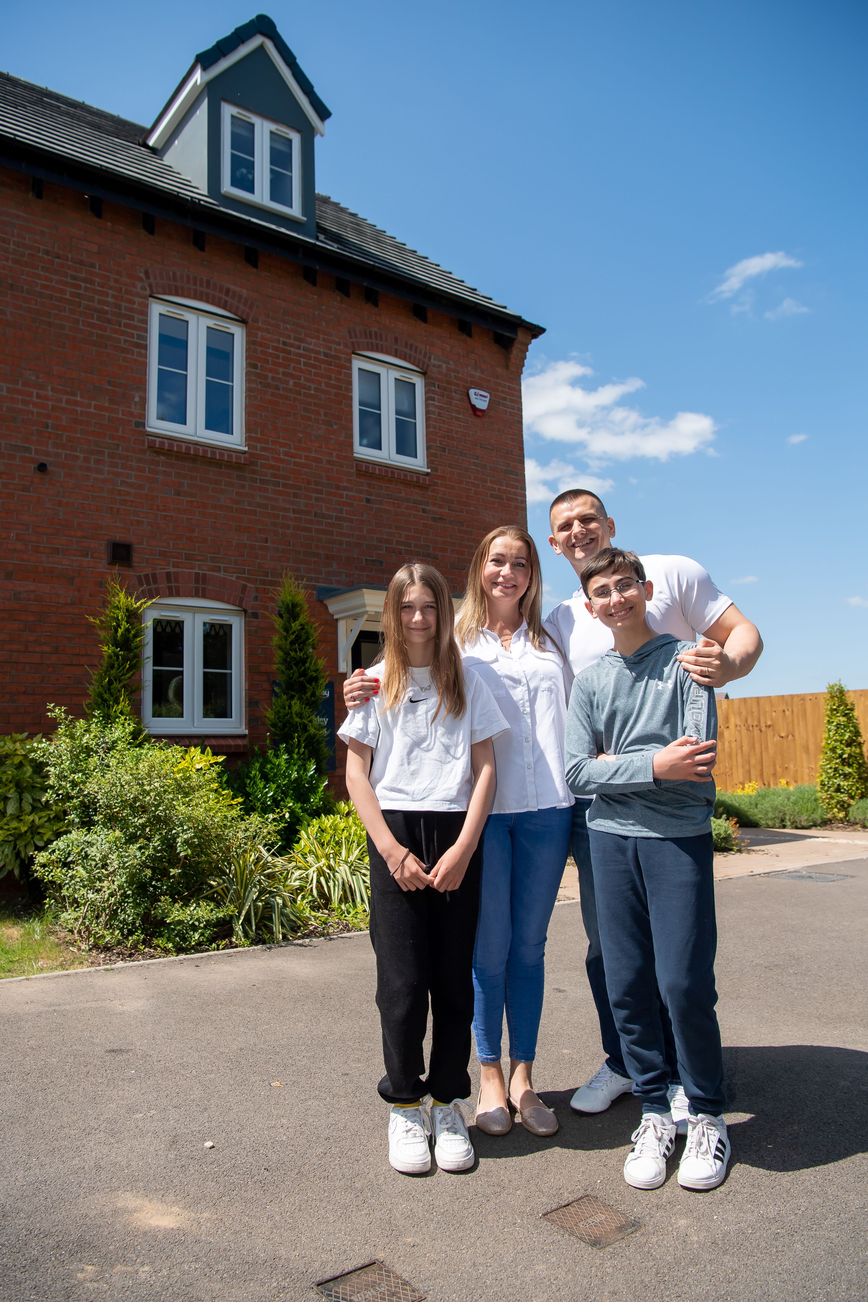 Pawel and Julia Pieciak outside the showhome at Bellway’s Hazelwood development in Cubbington