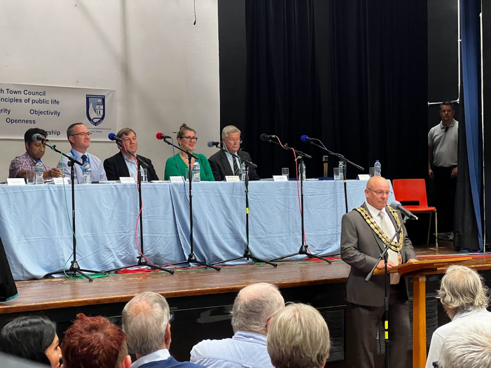 Burnham Town Mayor Duncan Rawlinson (pictured at the lectern) says the public debate held last week was "the biggest political event in the town's history". (Photo: Ben Shahrabi)