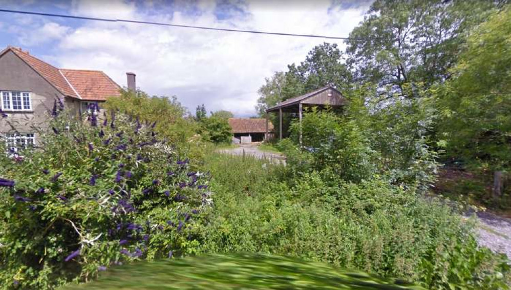 Looking towards one of the barns that can be converted into a home (Photo: Google Street View)