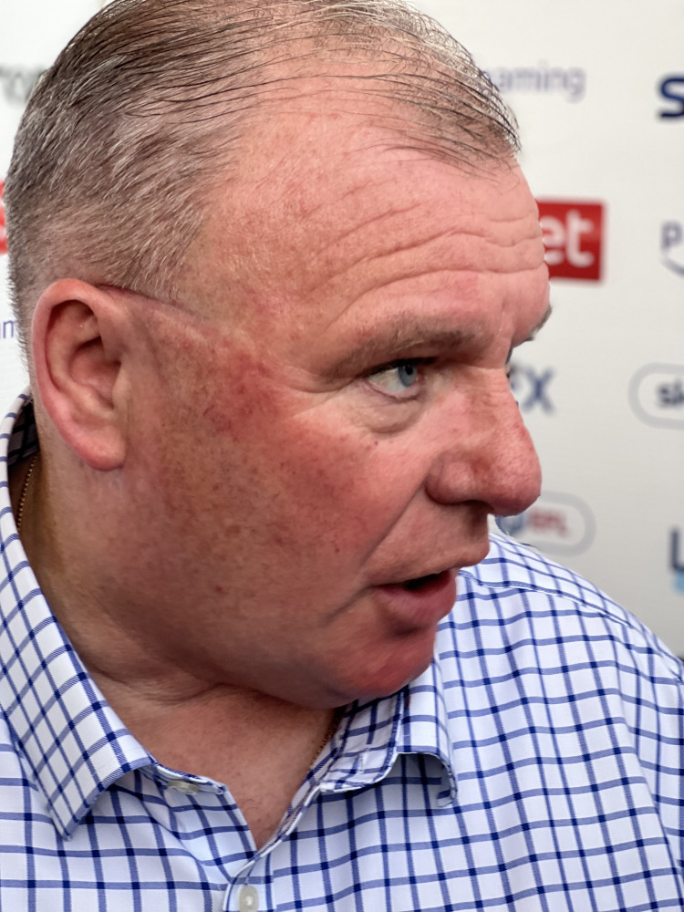 Three Reasons Why Steve Evans should ignore Hibernian interest and stay at Stevenage FC. PICTURE: Steve Evans speaking to the press after a Stevenage game at the Lamex. CREDIT: @laythy29
