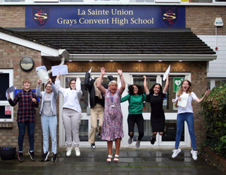 Headteacher Penny Johnson joined in the celebrations as students were jumping for joy. 