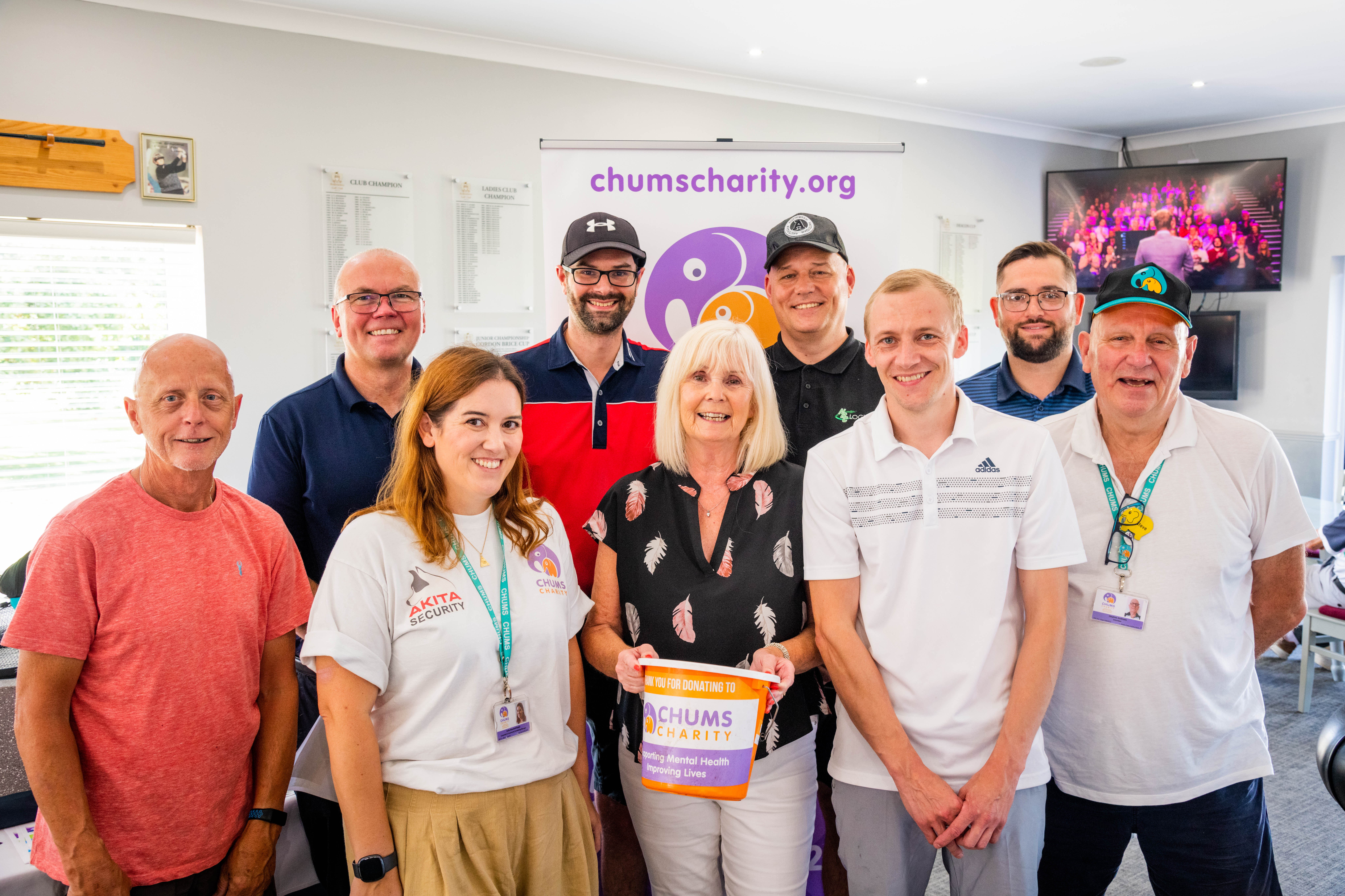 All CHUMS together: CHUMS charity staff and volunteers at the golf day. CREDIT: CHUMS
