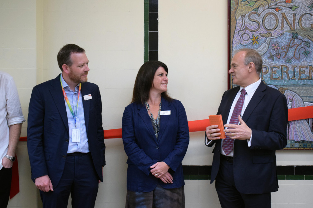 Mark Killick (left) and Claire Mann (middle) and Ed Davey (right) at Surbiton station. (Photo: Network Rail)