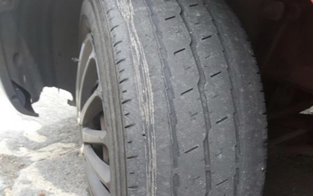 Tyred out - one of the tyres on the stopped vehicle